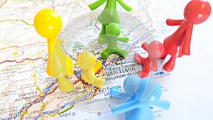 Mothers talking with their babies at a playgroup on a map of Barcelona