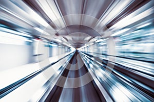 Motion blur abstract background, fast moving walkway or travelator in airport terminal transit zoom effect. Transportation concept