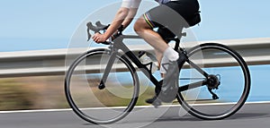 Motion blur of a bike race with the bicycle and rider at high speed