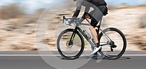 Motion blur of a bike race with the bicycle and rider at high speed