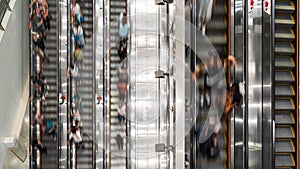 Motion blur of crowd Asian people transport on escalator at subway underground station in Hong Kong. Public transportation