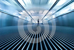 Motion blur of moving escalator in airport