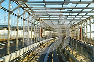 Motion blur of train moving inside tunnel in Odaiba, Tokyo