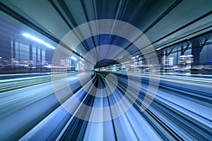 Motion blur of train moving inside tunnel in Tokyo, Japan