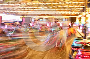 Motion blur, vibrant coloured bumper cars, dodgems. Velez Malaga fair, Spain.