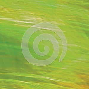 Motion Blurred Bright Meadow Grass Background, Abstract Green, Yellow, Amber Horizontal Texture Pattern Copy Space