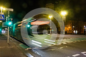 The motion of a blurred bus on the avenue