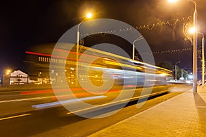 Motion blurred bus on the overpass road