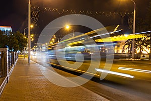 Motion blurred bus on the overpass road