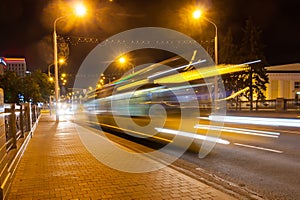 Motion blurred bus on the overpass road