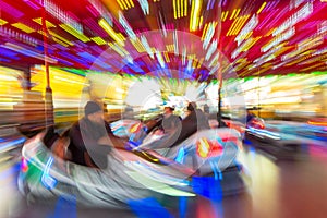 Motion Blurred Dodgems or Bumper Cars at a Fun Fair