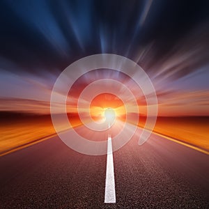 Motion blurred empty asphalt road