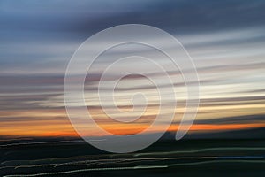 Motion blurred line sky in sunset abstract nature blur background