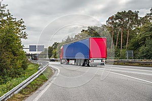 Motion blurred trucks on highway.   Logistics and transportation