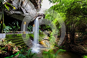 Motion blurred water  in  the temple under waterfall Wat Tham Heo Sin Chai waterfall. Kaeng Tana National Park, Ubonratchathani, photo