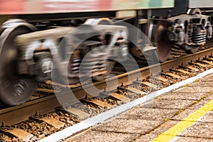 Motion blurred wheels of train