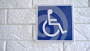 The motion of handicapped parking sign on the wall with 4k resolution. 4k stock footage.