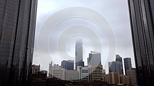 Motion Lapse time-lapse of modern city | Abu Dhabi most iconic towers and landmarks - World Trade Center Towers on a cloudy day