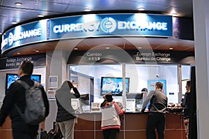Motion of passengers at foreign currency exchange place inside YVR airport