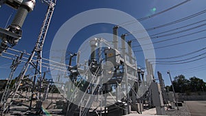 Motion past capacitor banks to circuit beakers at substation