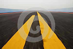Motion on the road with yellow traffic lines