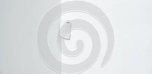 motion sensor in the white corner. device that tracks movement of objects.