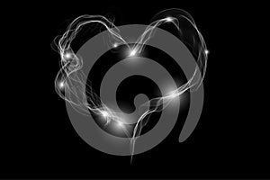Motion of smoke heart shape isolated on the dark background