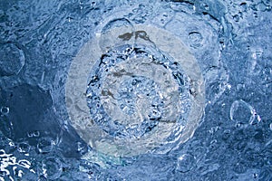 Motion and splash of blue water