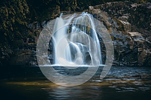 Motion of Water Waves in a Fall