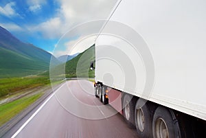 Motion of white semi-truck