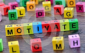 Motivate word on table