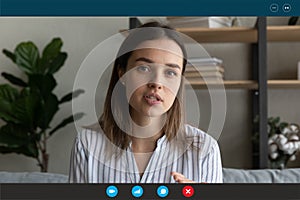 Motivated woman talk on video call from home