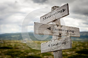 motivating encouraging enabling signpost outdoors