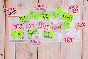 Motivating phrases like Now, can do it, Yes, on sticky notes