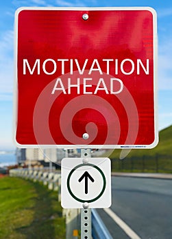 Motivation Ahead red sign board