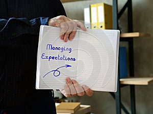 Motivation concept meaning Managing Expectations with inscription on the page