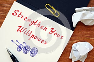 Motivation concept meaning Strengthen Your Willpower with inscription on the sheet