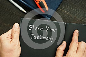 Motivational concept meaning Share Your Testimony with phrase on the piece of paper