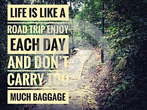 Motivational and Inspiration quote text - Life is like a road trip enjoy each day and don't carry too much baggage