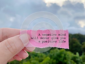 Motivational and inspirational quote concept background - A negative mind will never give you a positive life.