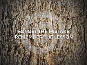 Motivational and Inspirational quote of forget the mistake remember the lesson. Stock photo.