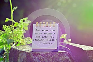 Motivational and inspirational quote with phrase - The more you trust yourself, the less you compare yourself to others