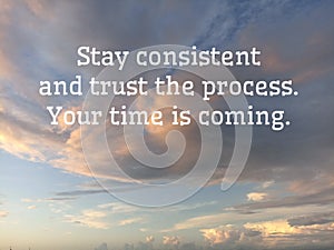 Life inspiraitonal motivational quote - Stay consistent and trust the process. Your time is coming. On sunset blue sky background. photo