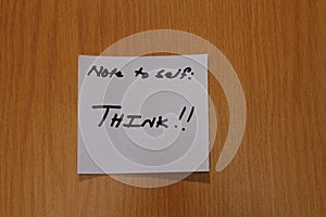 Motivational note with the word think written on it
