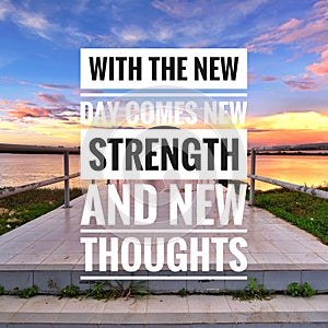 Motivational quote on sunset background - with the new day comes new strength and new thoughts