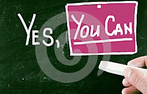 Motivational quote "yes, you can" on the blackboard