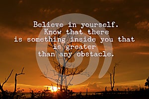 Motivational quotes with sunset background photo