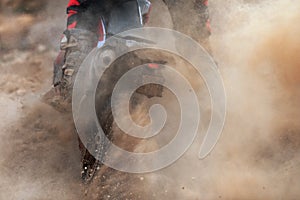 Motocross racer accelerating speed in track,driving