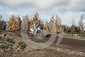 Motocross rider on race track