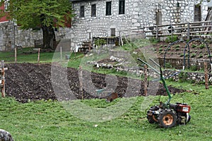 The Motocultivator parked on the meadow